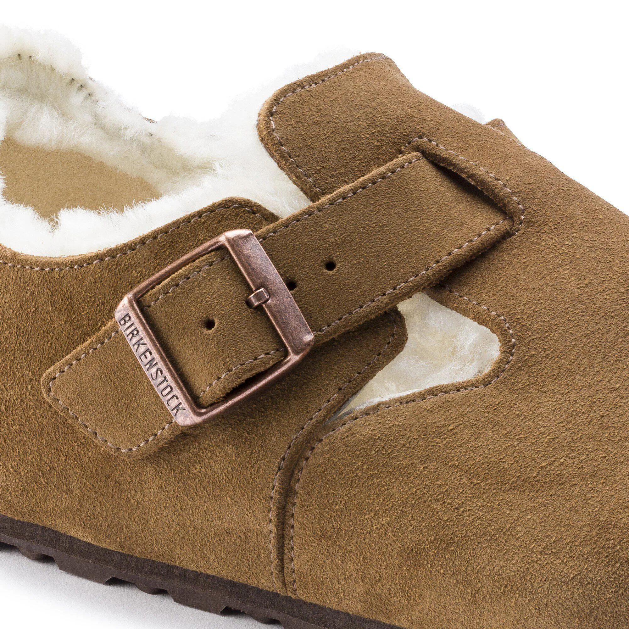 Mocassin en cuir de veau et suède à fourrure de mouton